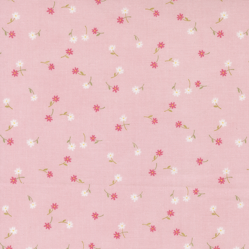 A light pink fabric with tossed small pink and white flowers and stems.
