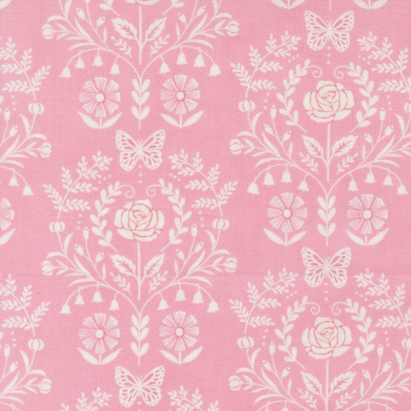 A pink fabric with a cream damask design.