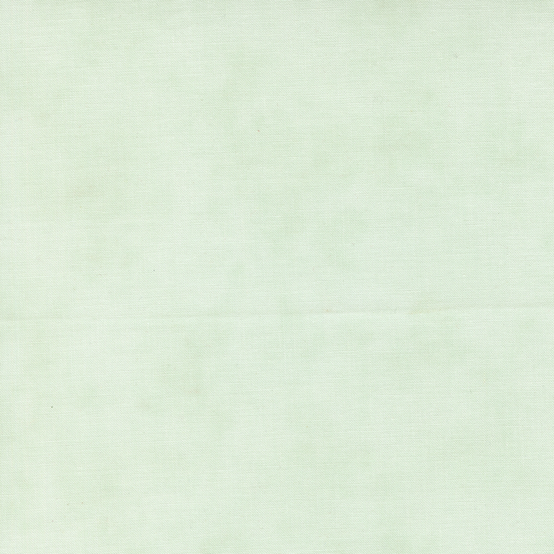 A very lightly textured misty green fabric.