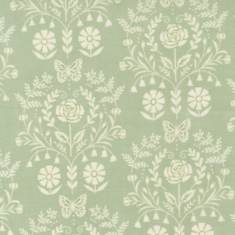 A sage green fabric with a cream damask design.