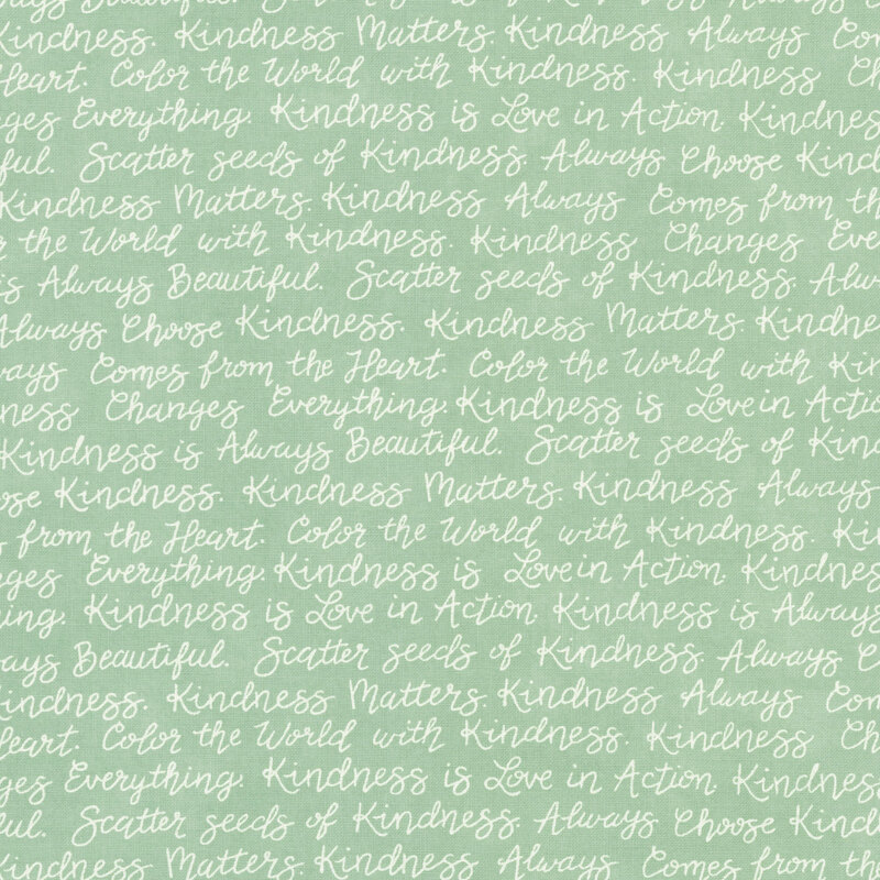 A sage green fabric with rows of uplifting sayings in cursive white text.