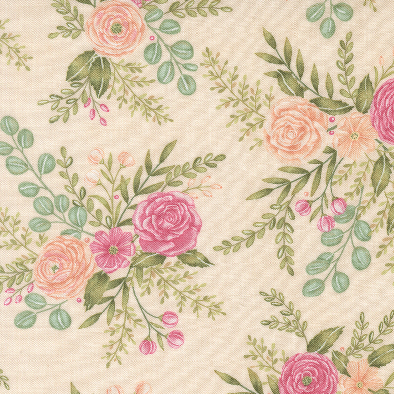 A peach fabric with tossed bouquets of coral and pink florals and eucalyptus leaves.