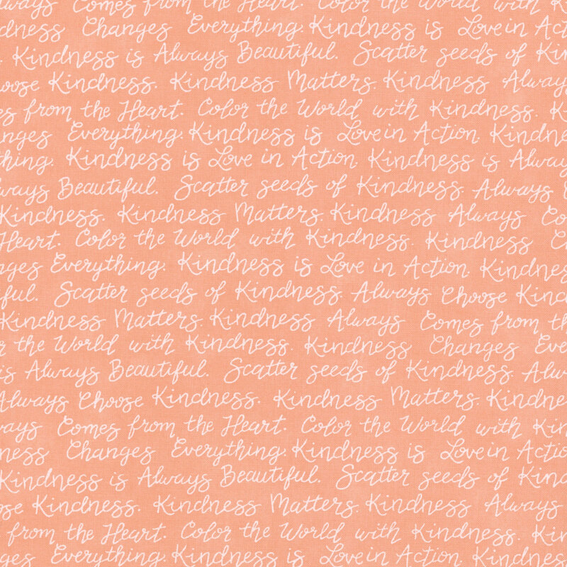 A coral fabric with rows of uplifting sayings in cursive white text.