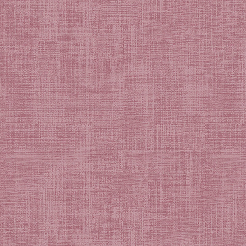 Pink fabric with a subtle texture pattern and varying shades of pink.