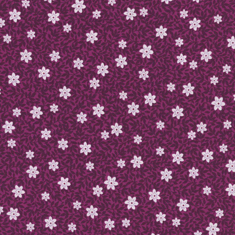 Plum fabric with tonal leaves and white florals.