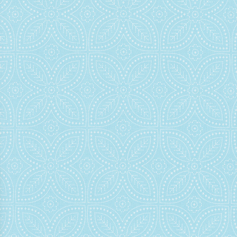 Light aqua fabric featuring an intricate floral design