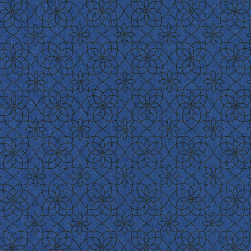 Dark blue fabric featuring a floral and circular pattern with intricate lines and flowers.