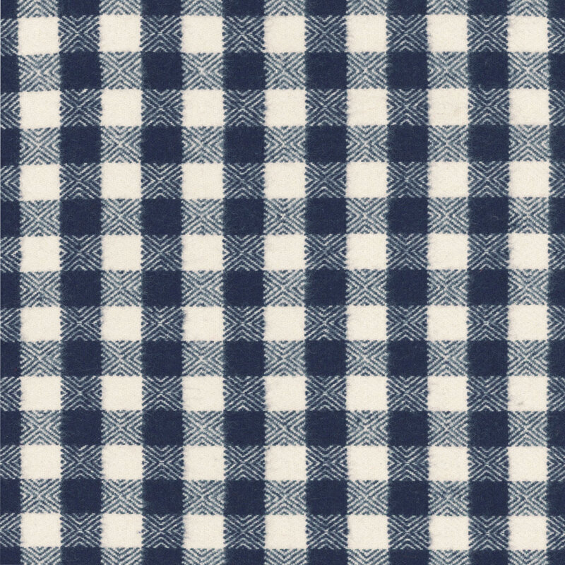 Cream fabric with a blue gingham pattern.