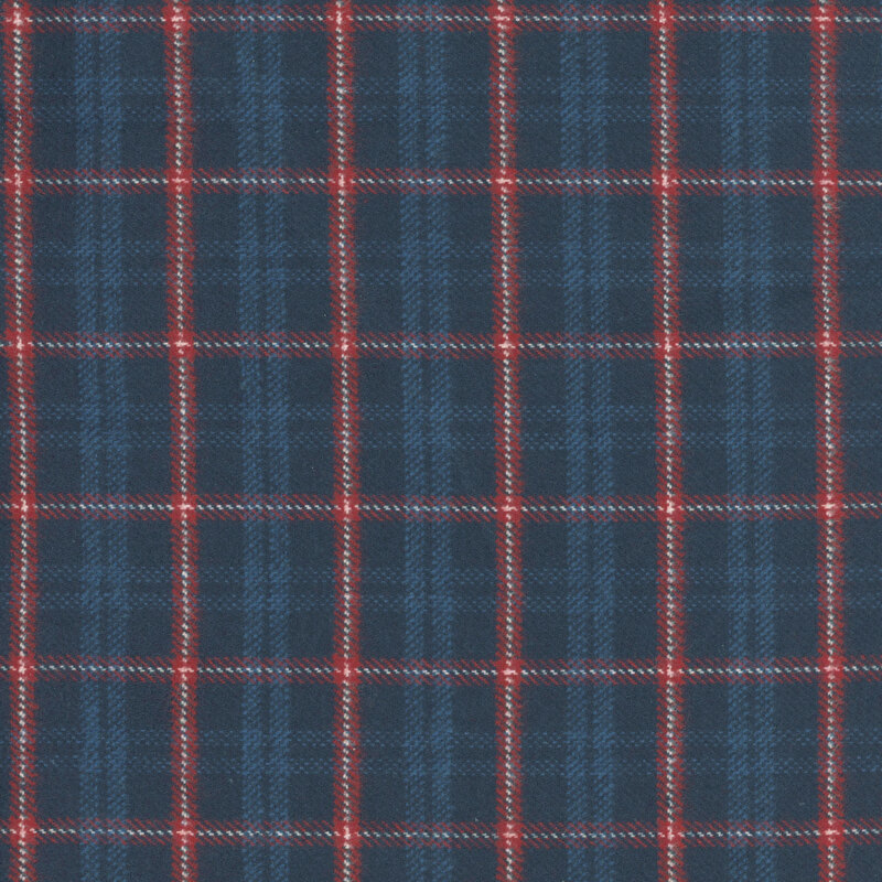 Dark blue fabric with a red plaid pattern.