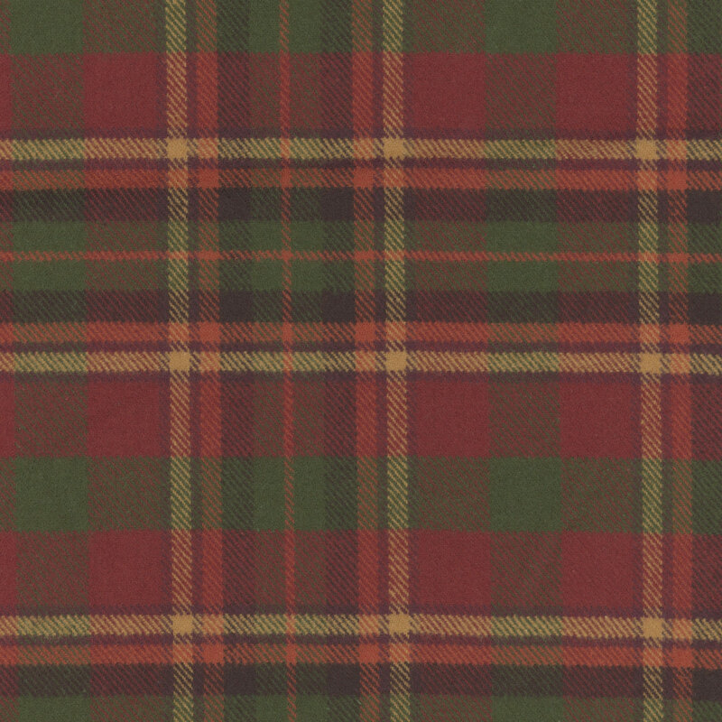 Flannel fabric in a red, green, and tan plaid pattern.