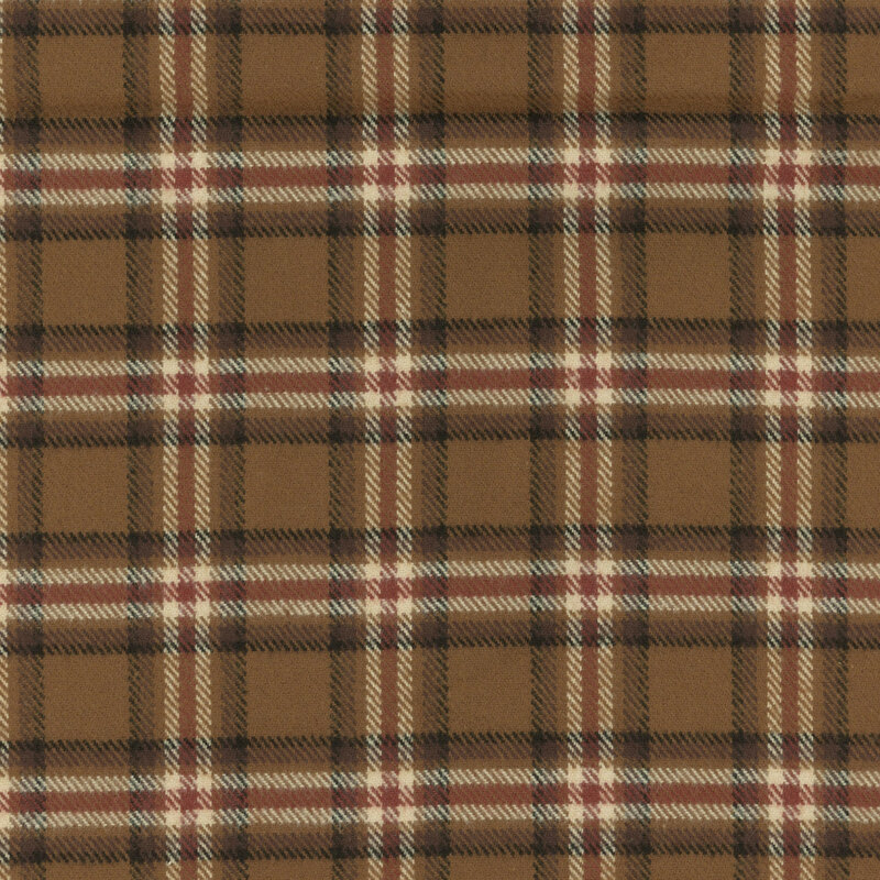 Flannel fabric with blue and tan plaid on a suede background.