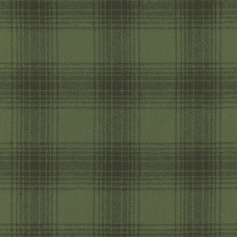 Flannel fabric in a tonal green plaid pattern.