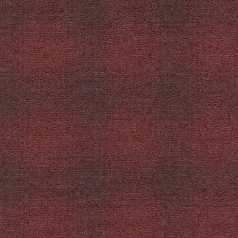 Flannel fabric in a tonal red plaid pattern.