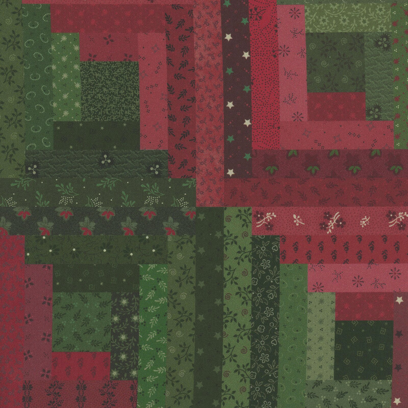 Cheater panel fabric with a red and green log cabin block motif featuring prints with primitive and calico designs.