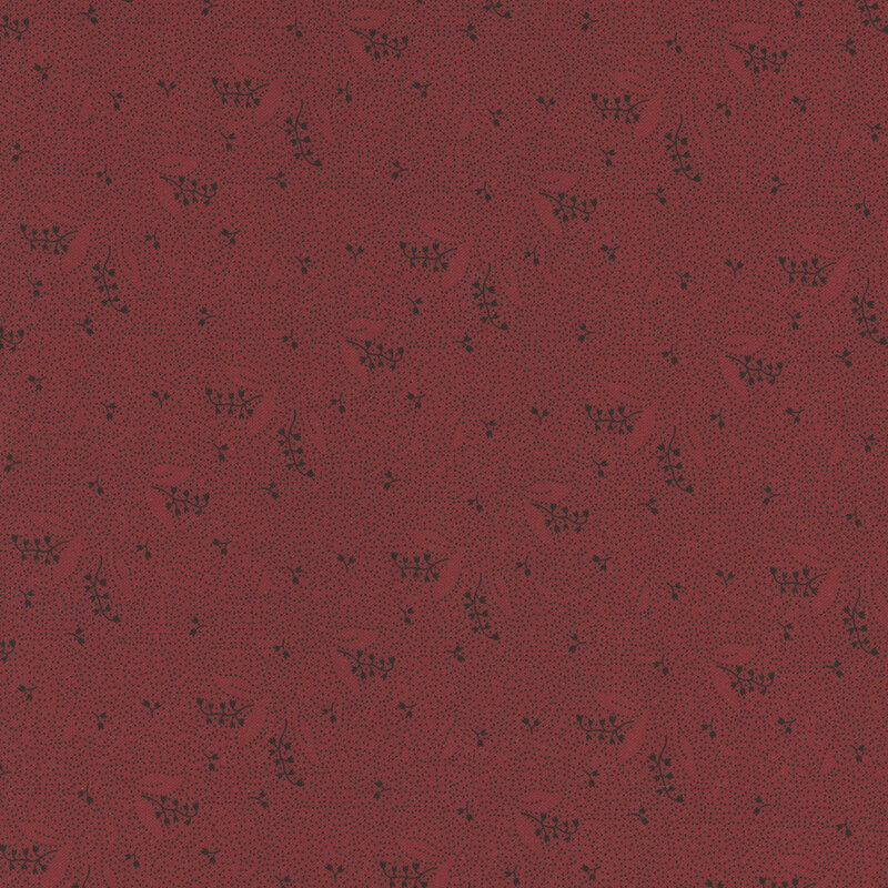 Maroon red fabric with floral motifs and dots