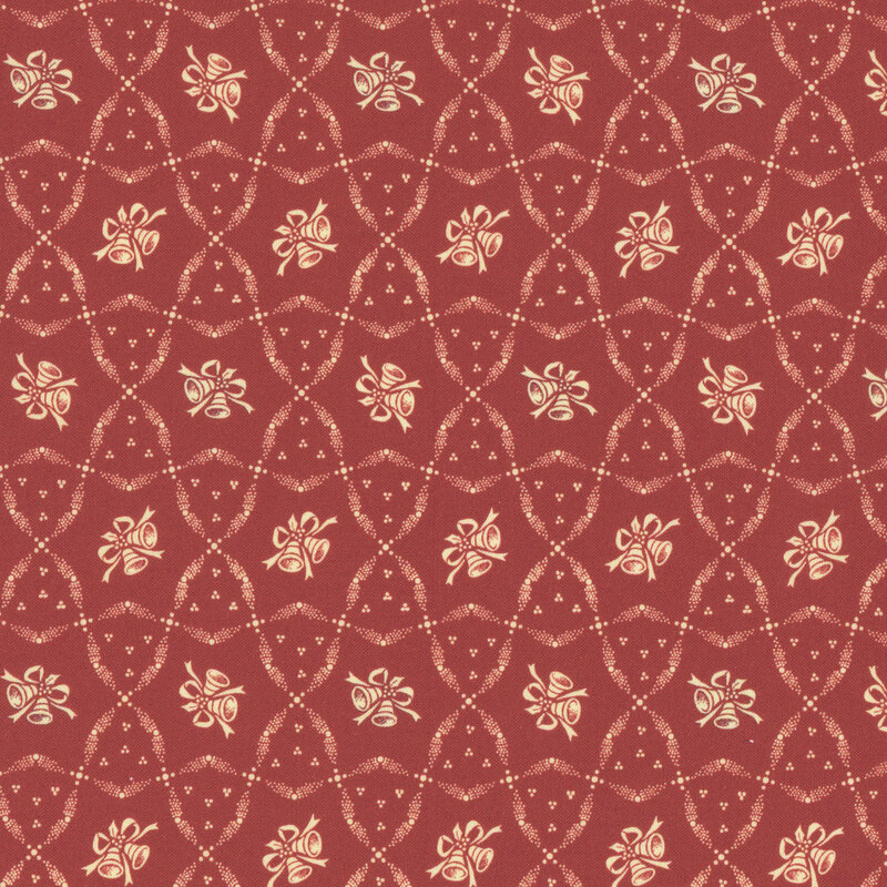 Red fabric with ditsy bells and interweaving ribbons.