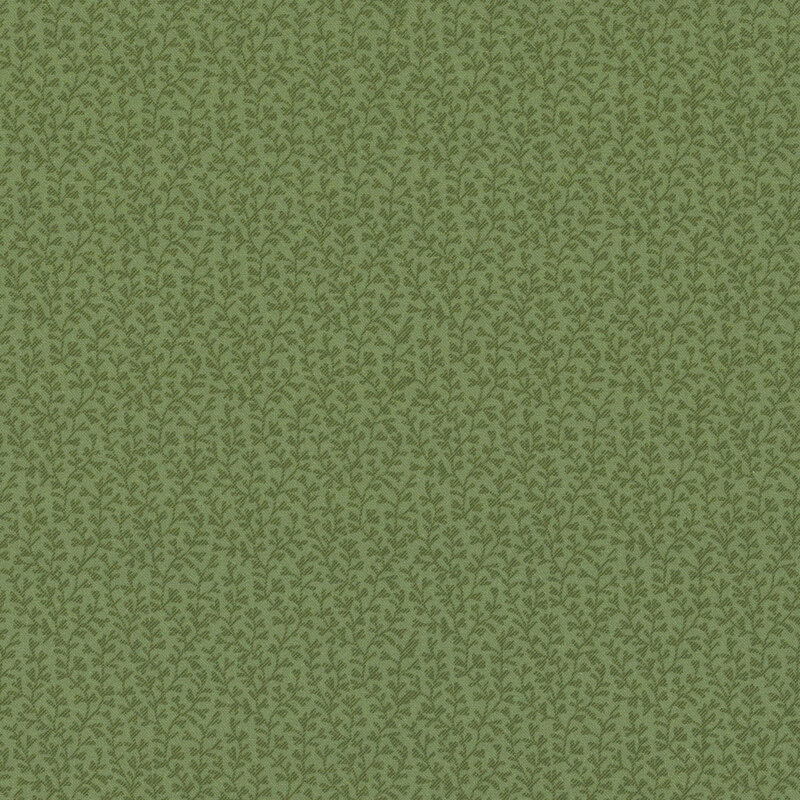 Green fabric with tonal lines of leafy vines.