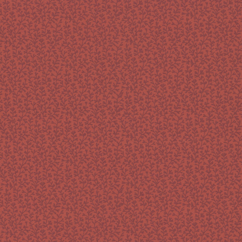 Red fabric with tonal lines of leafy vines.