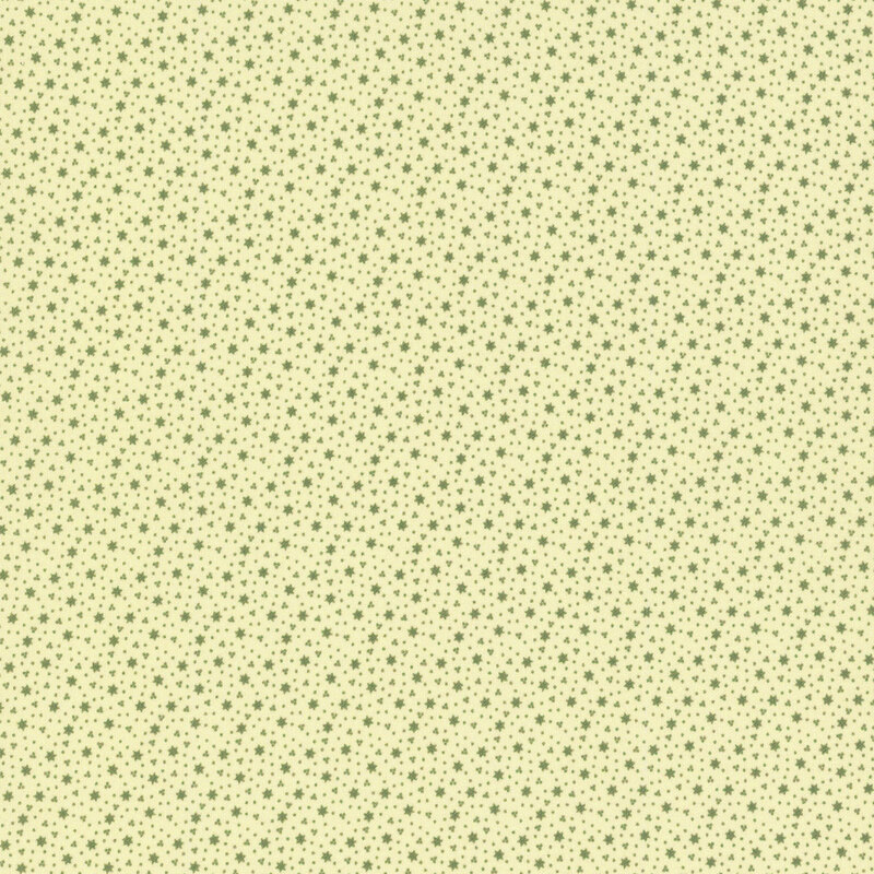 Cream fabric with tiny green stars and berry clusters.