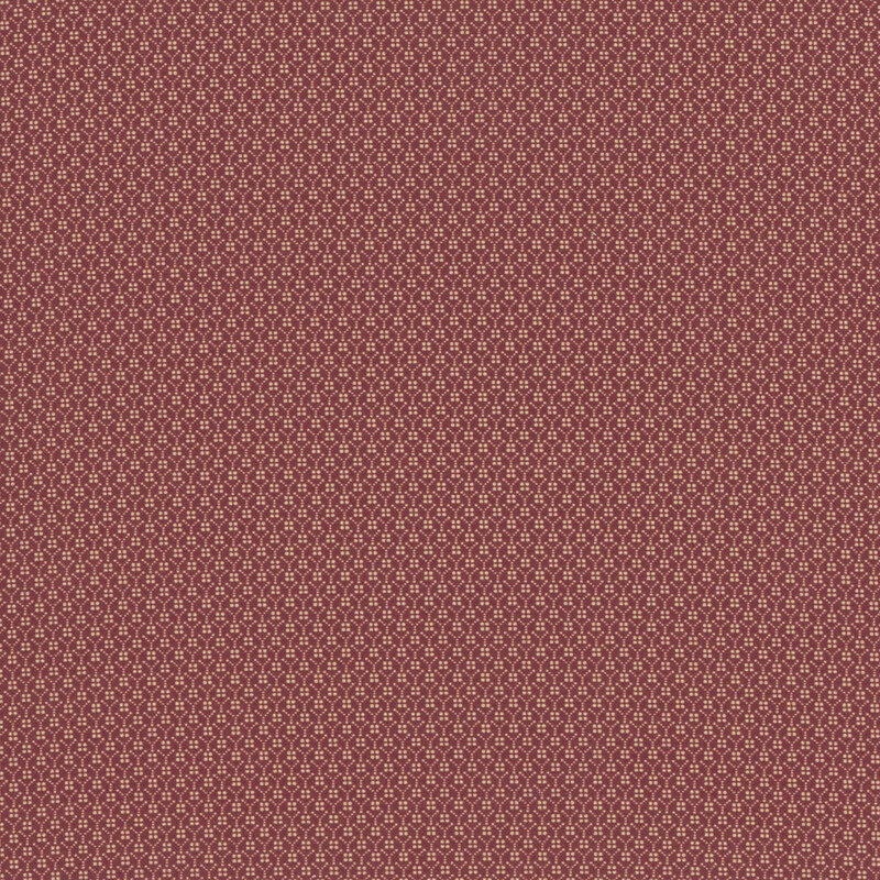 Red fabric with a tiny geometric square pattern.