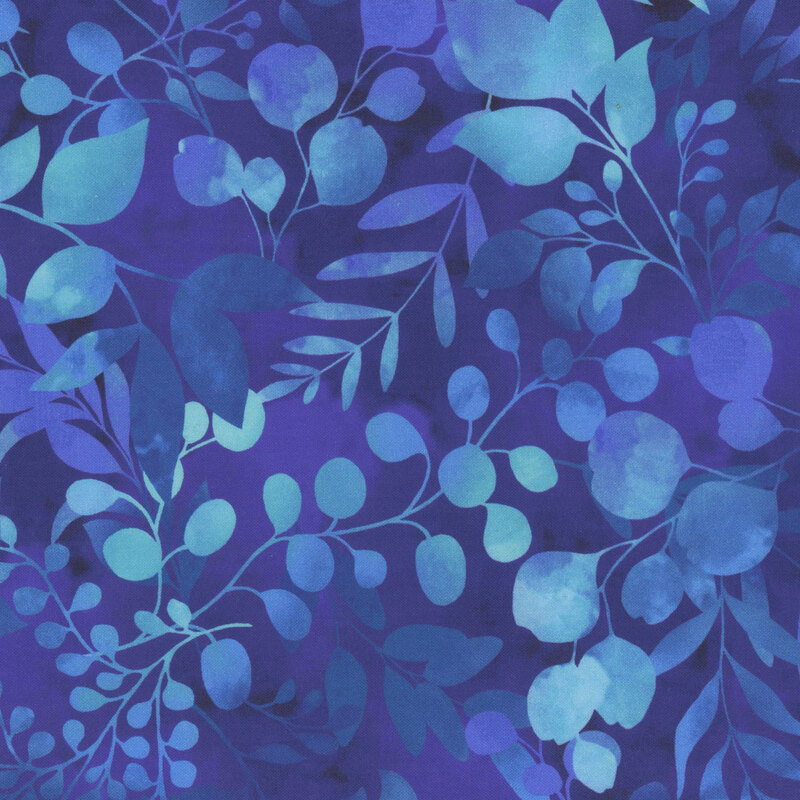 Mottled blue fabric featuring blue and aqua botanical leaves and foliage
