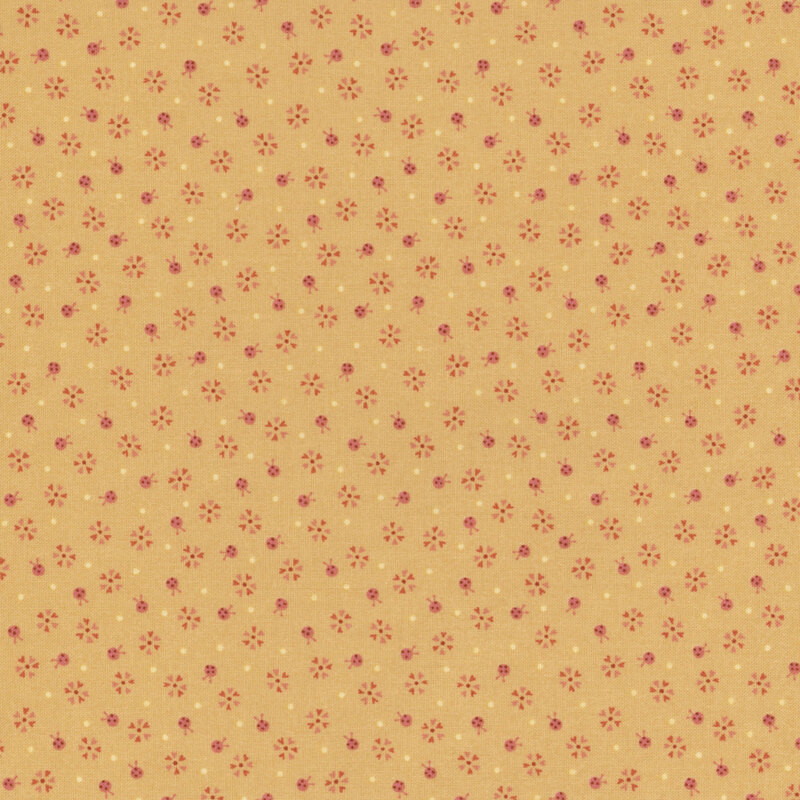 Yellow fabric with small pink ladybugs, flowers, and pinprick dots.