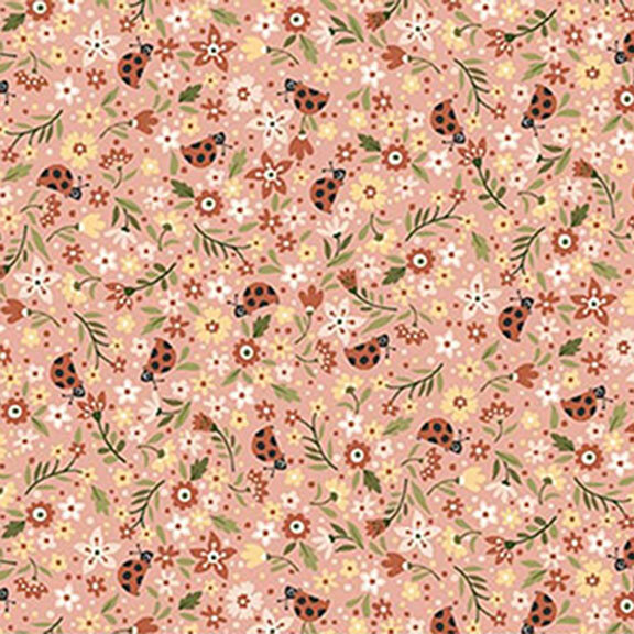Packed salmon pink fabric with white, yellow, and red flowers amongst tossed ladybugs.