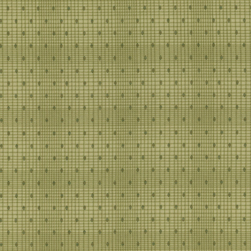 Green fabric with a grid texture and neat rows of small tonal dots.