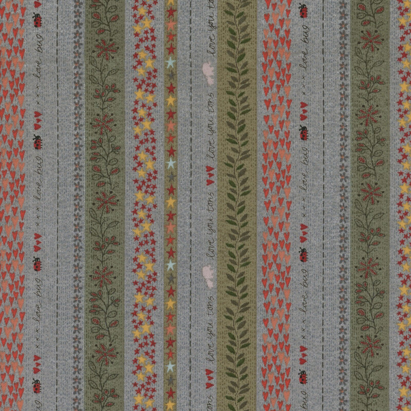 Gray and green fabric with varying rows of words, ladybugs, leaves, hearts, stars, flowers, and stripes.