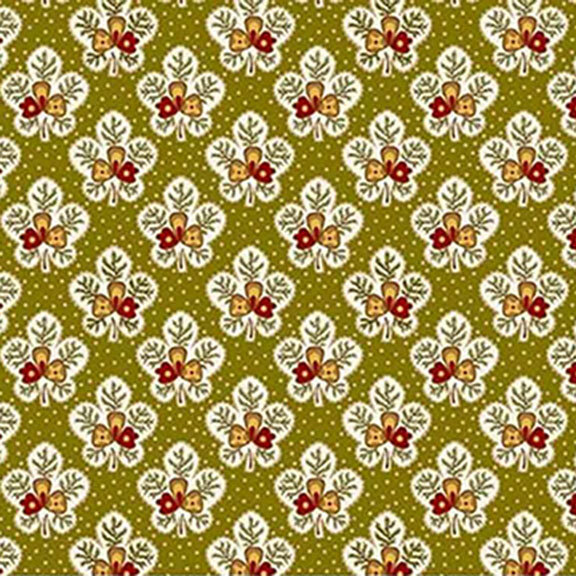 Green fabric featuring half-drop ornamental and floral patterns in white, red, and yellow.