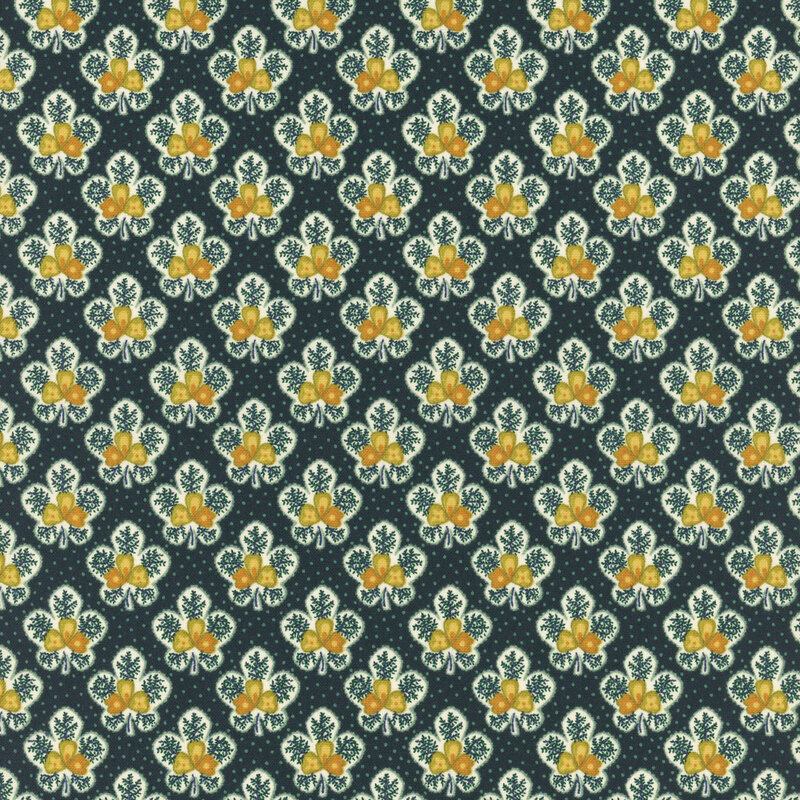 Blue fabric featuring half-drop ornamental and floral patterns in white, yellow, and green.