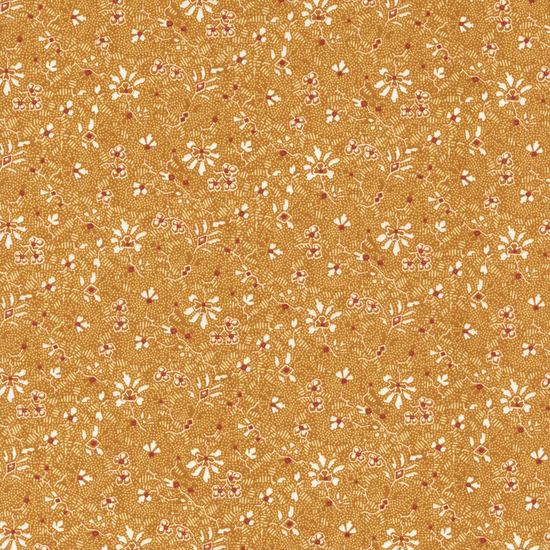 Ocher fabric featuring white floral and leaf patterns.