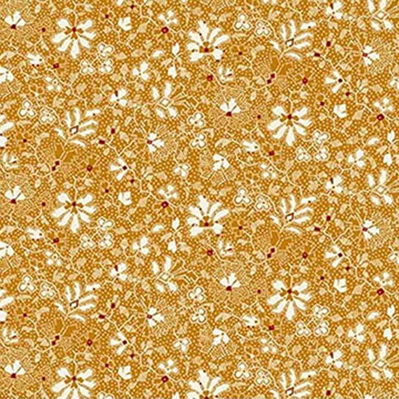 Orange fabric featuring white floral and leaf patterns.