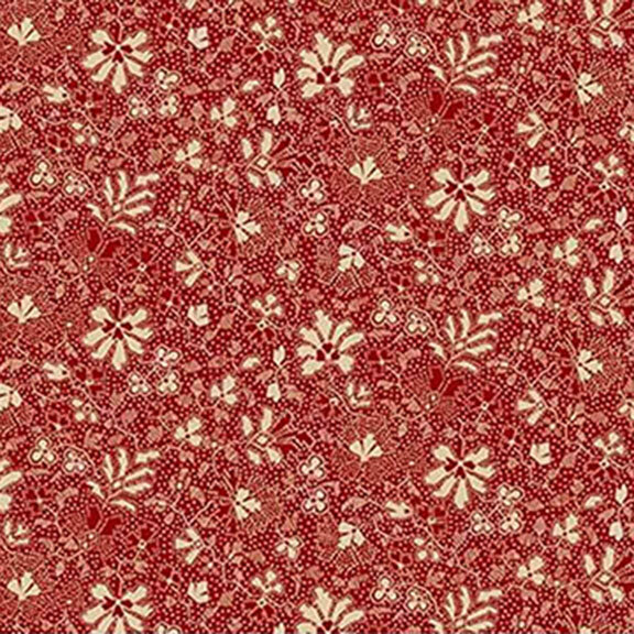 Red fabric featuring white floral and leaf patterns.