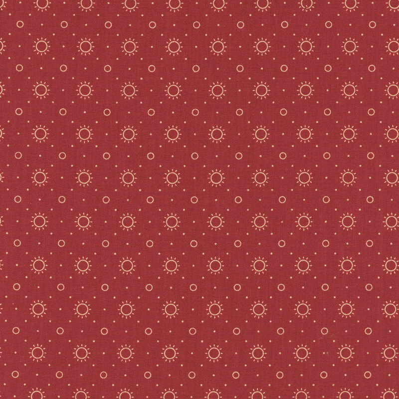 Repeating pattern of white suns and small circles on a red fabric.