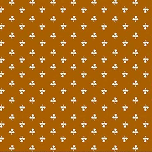 Orange fabric featuring a ditsy print of white tulips.