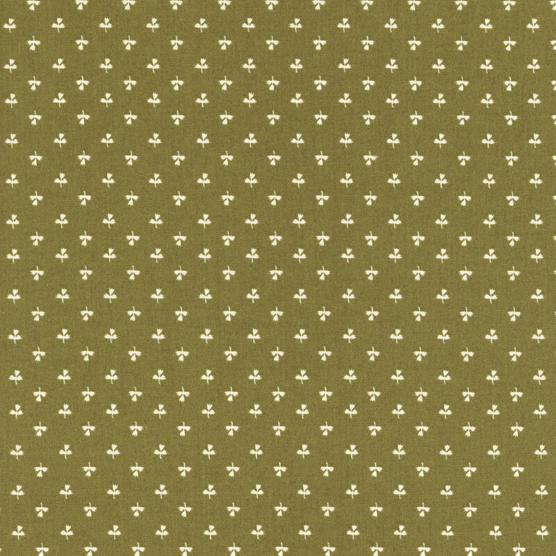 Green fabric featuring a print of white tulips.