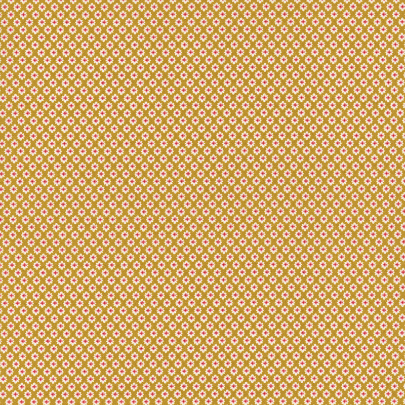 Yellow fabric featuring a print in tan and red geometric patterns.