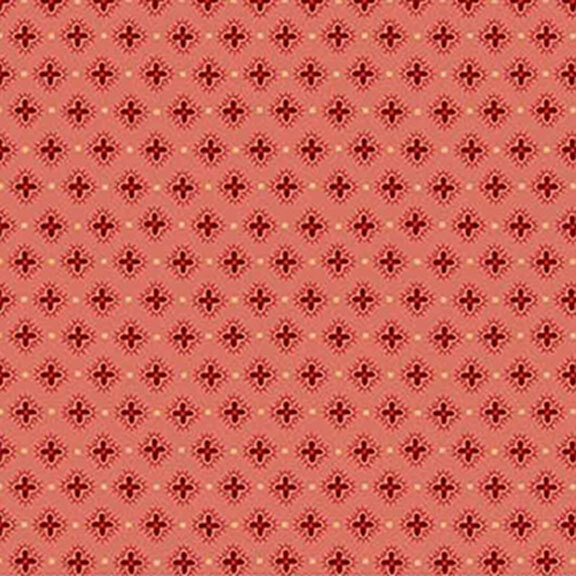 Pink fabric with half-drop red hibiscus flowers.