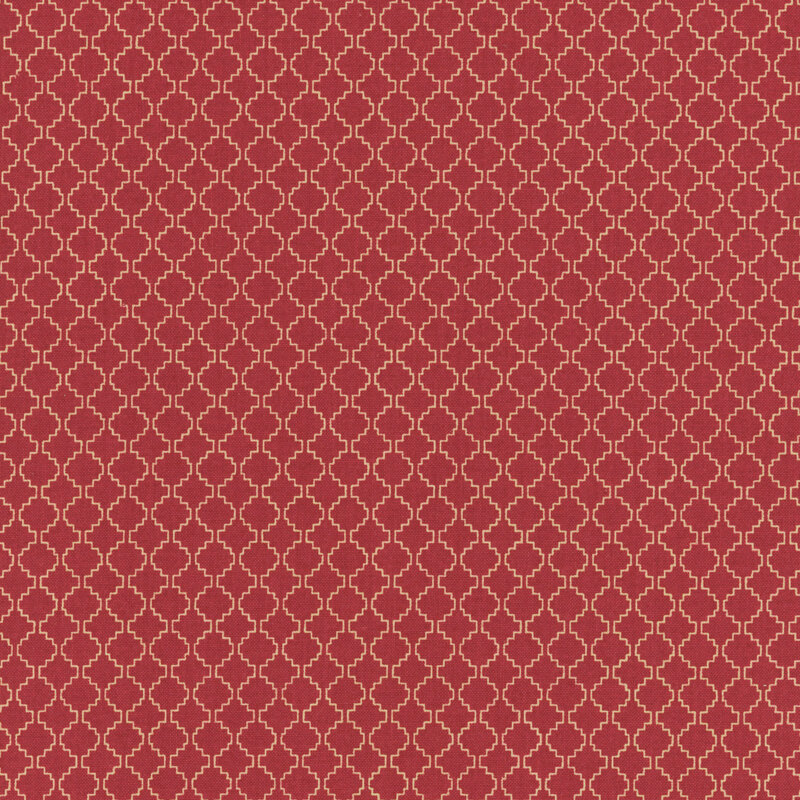 Red fabric with a repeating white geometric pattern.