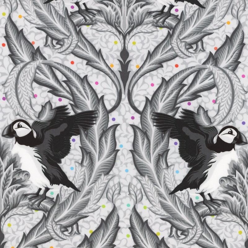 Light gray fabric featuring a decorative design with puffins surrounded by ornate foliage and flowers with colorful dots.