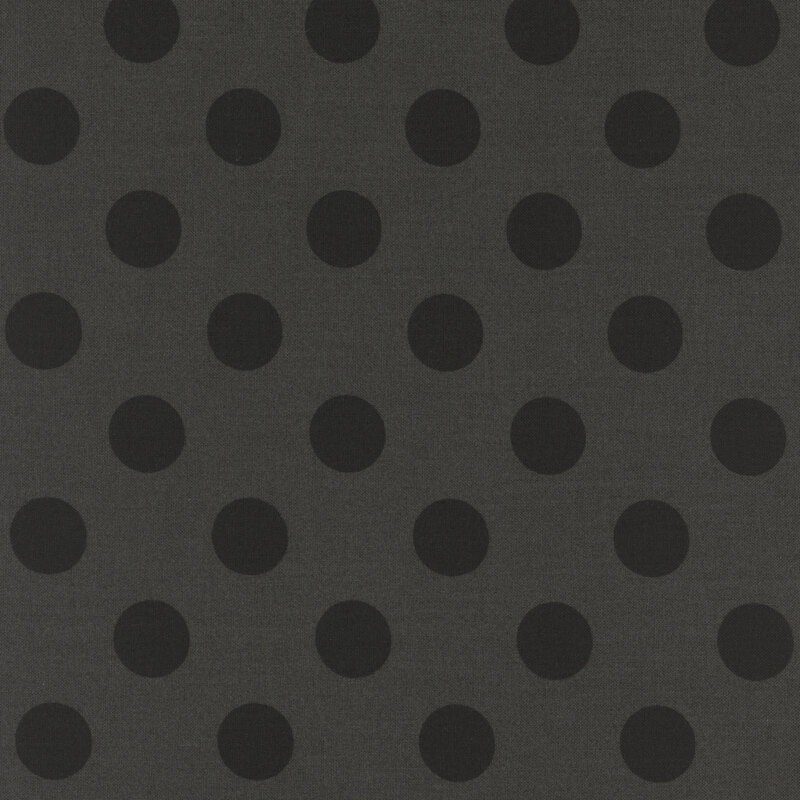 Warm black fabric with tonal polka dots