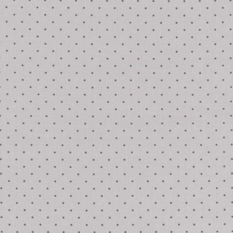 Gray fabric with small dark gray polka dots. 