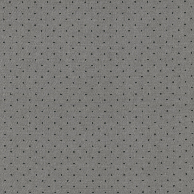 Gray fabric with small black polka dots. 
