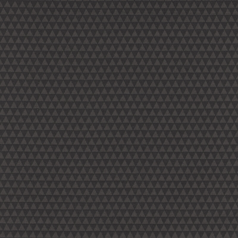 Black fabric featuring a repeating pattern of small triangles.