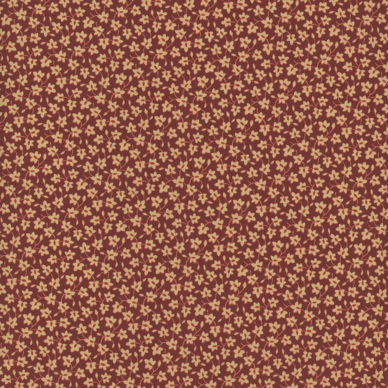 Red floral pattern on a textured burgundy background.