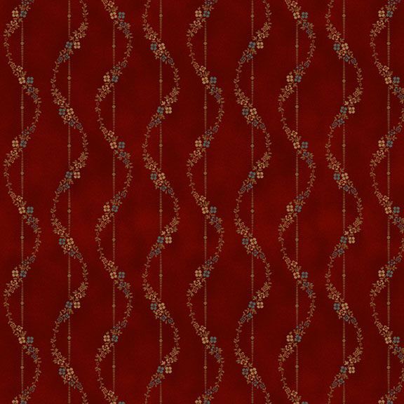 Textured red fabric with wavy lines and floral motifs in shades of gold and brown.