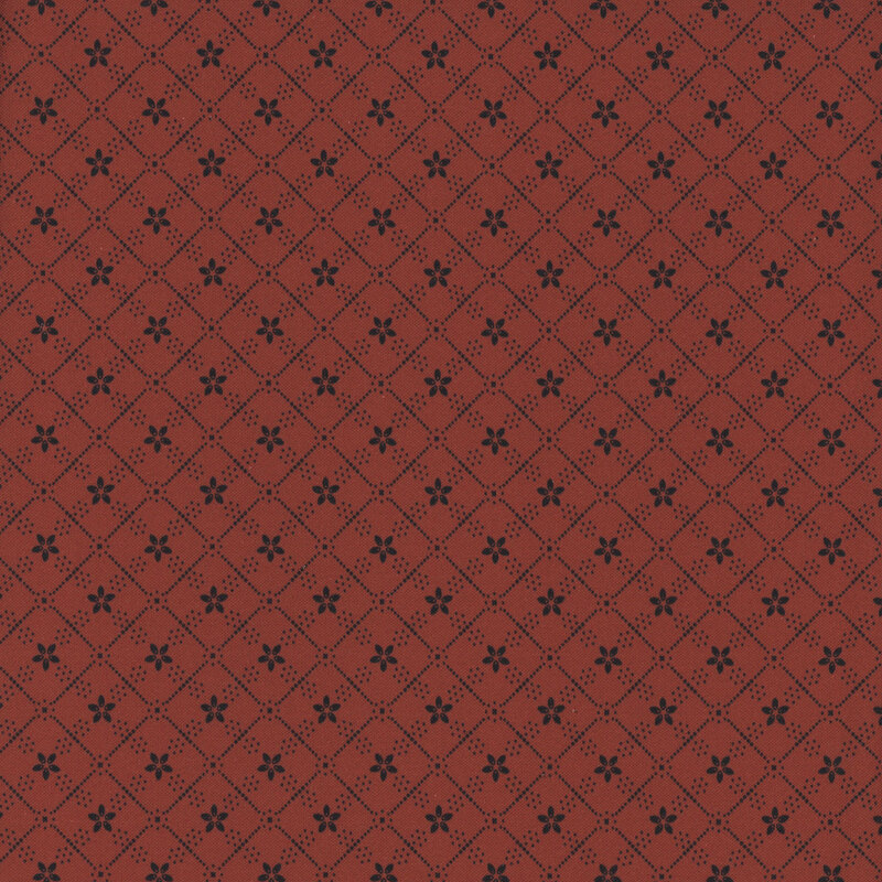 Red patterned fabric with a diamond grid design and small black floral motifs on a deep red background.