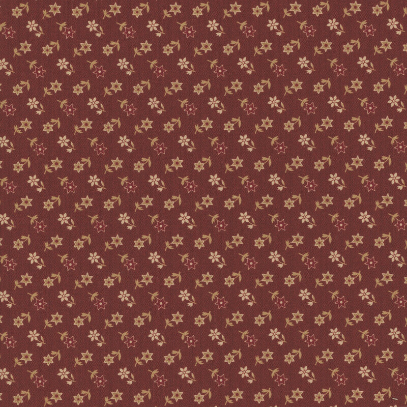 A burgundy fabric pattern featuring small, cream-colored floral motifs arranged evenly.