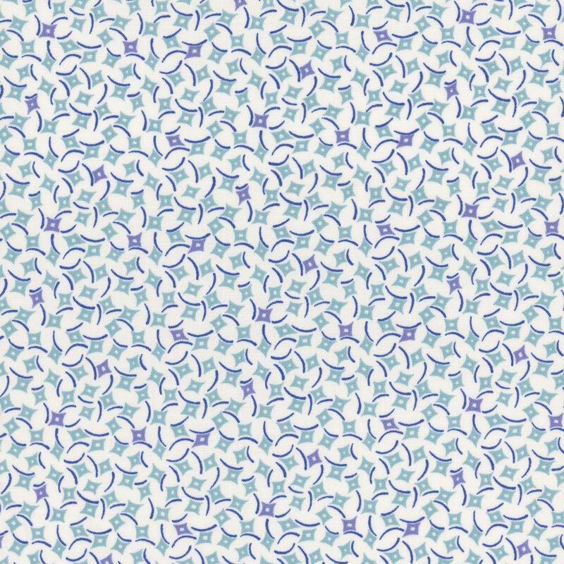 Cream fabric featuring a pattern of blue and turquoise diamonds.